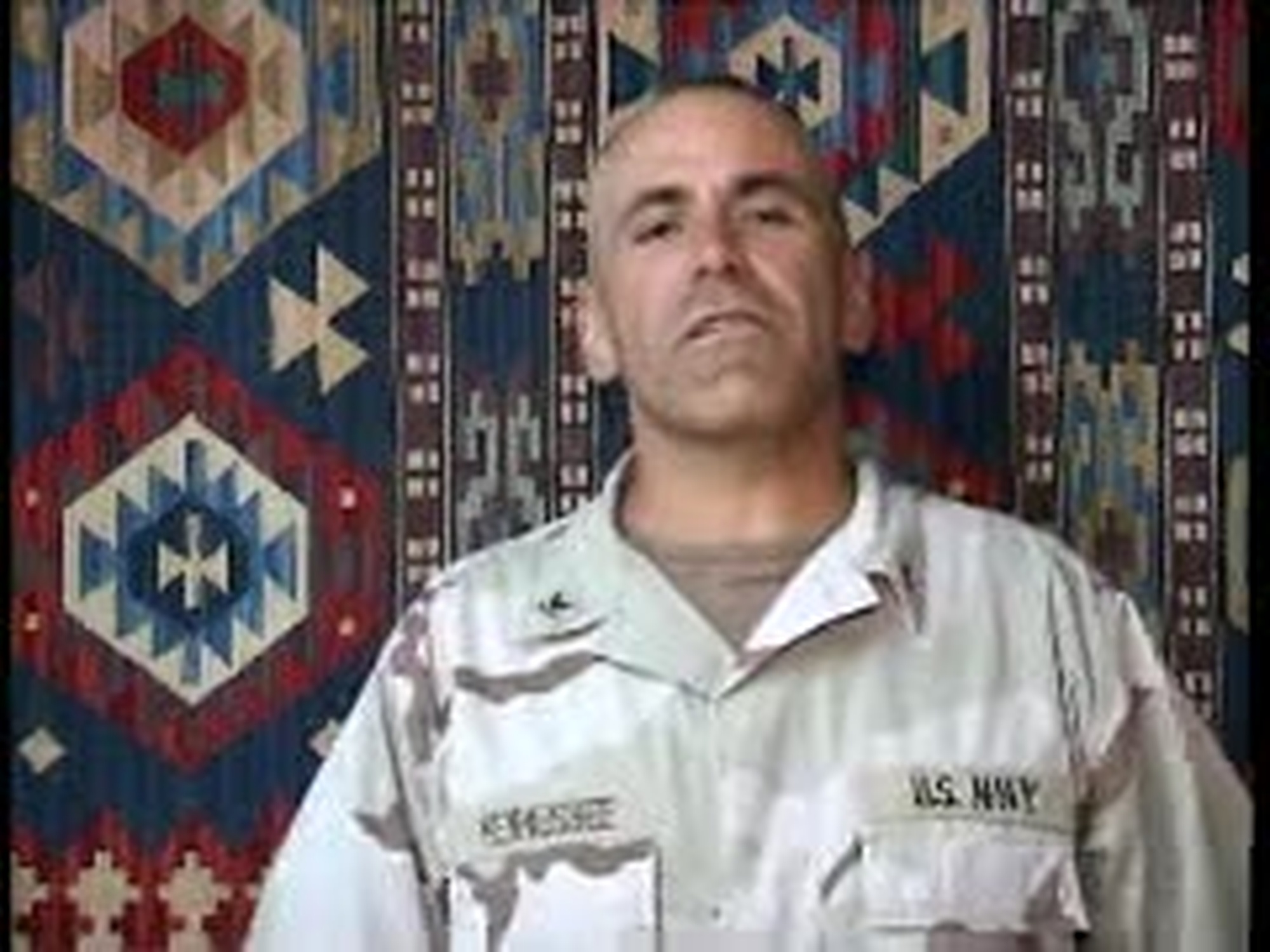 Petty Officer 3rd Class Kevin Hennessee sends a greeting to Florence, Oregon from Camp Patriot, Kuwait for Holiday Season 2006