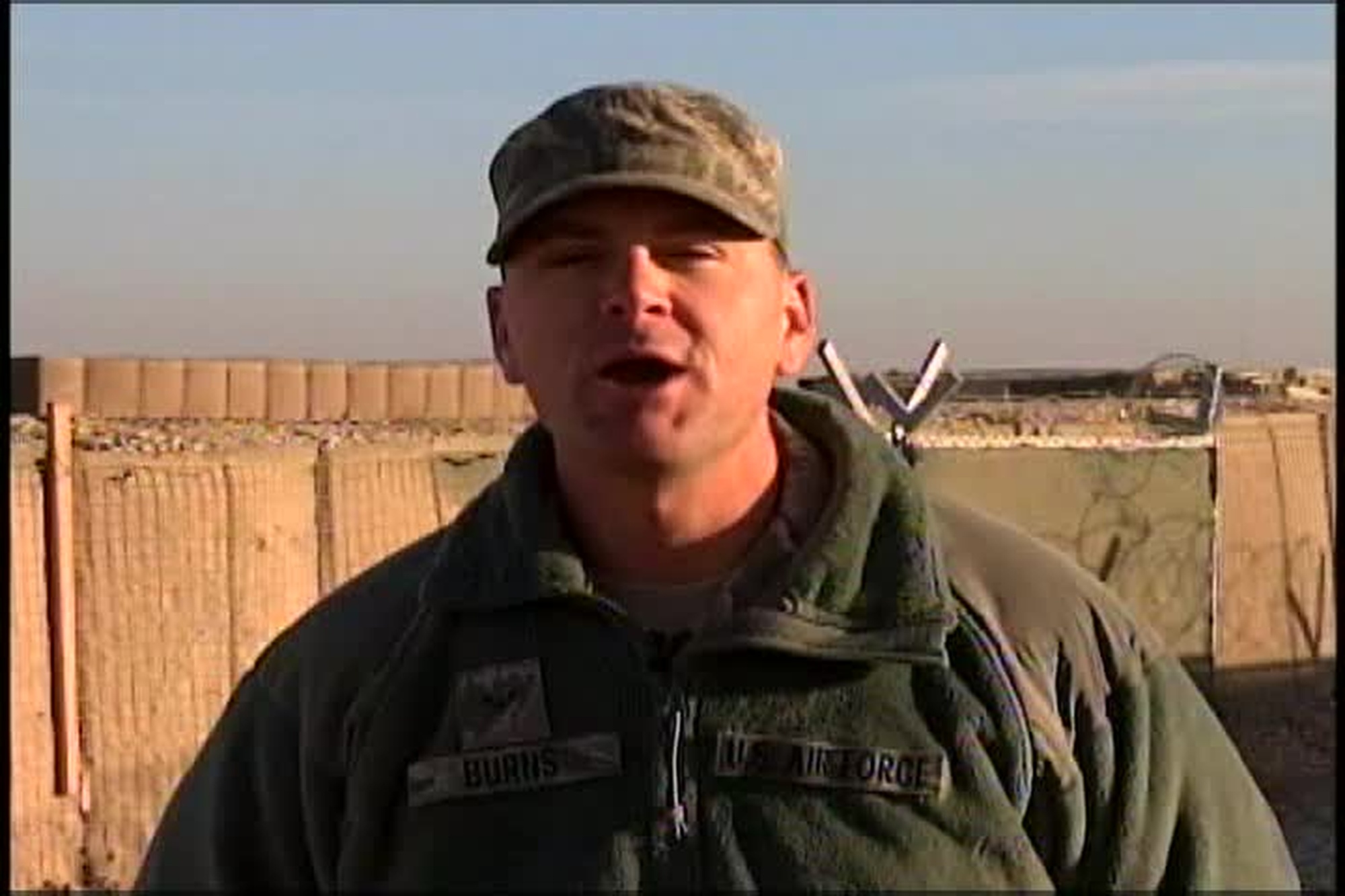 Airman 1st Class Ryan Burns sends a greeting to Poughkeepsie, New York from Camp Marmal, Afghanistan for Holiday Season 2010