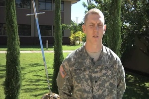 Spc. BRETT REYNOLDS