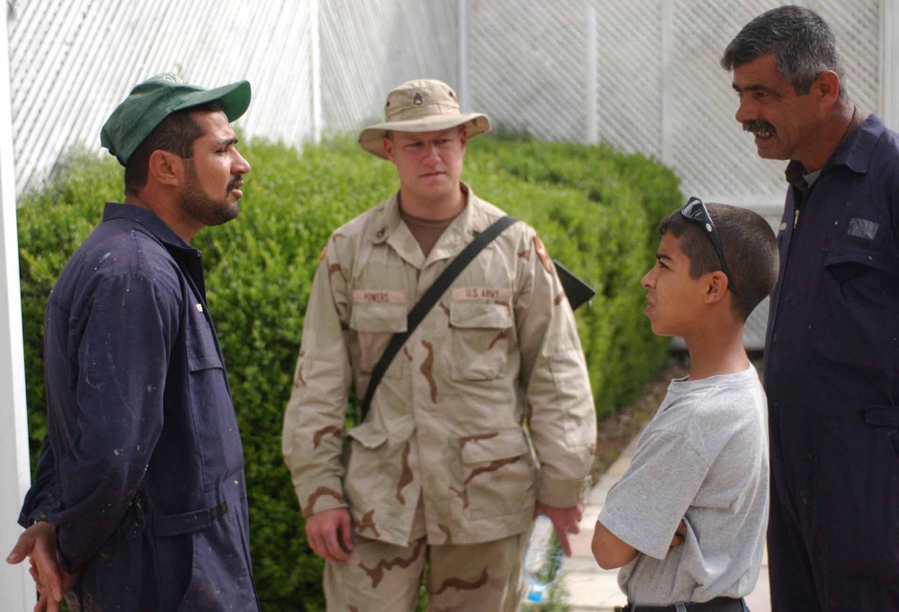 Iraqi boy assists Soldiers as an interpreter and a friend