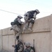 Infantrymen prepare and execute a major raid