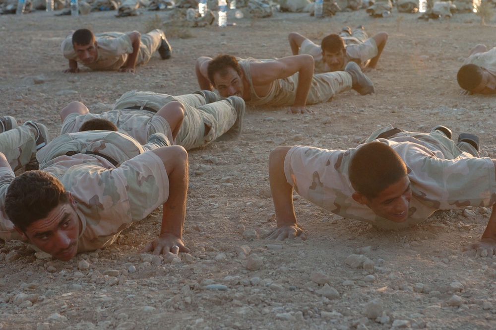 Iraqi National Guard soldiers conduct physical training