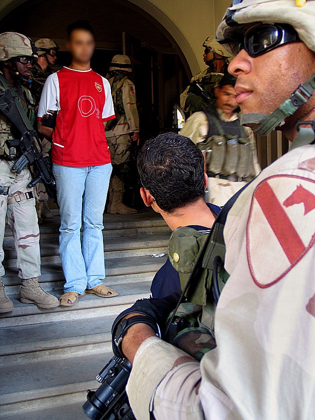 men arrested during security operations in central Baghdad's Tal