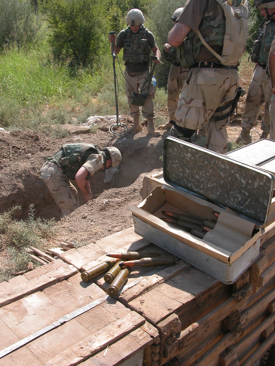 Soldiers Unearth Ammunition Cache