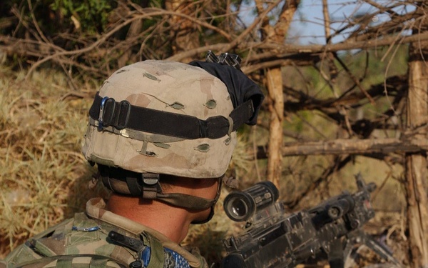 Stryker Soldiers and ING search for terrorists, weapons