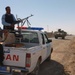 Iraqi police guard a checkpoint in Tal Afar