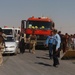 Emergency vehicles enter the city of Tal Afar