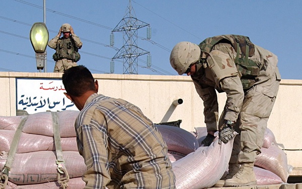 Soldiers Plant Seeds of Reconstruction