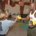 Cpt. Alice M. Coner strikes Billy Blanks hand