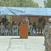 Dr. Bruska Shaways addresses the newly graduated soldiers