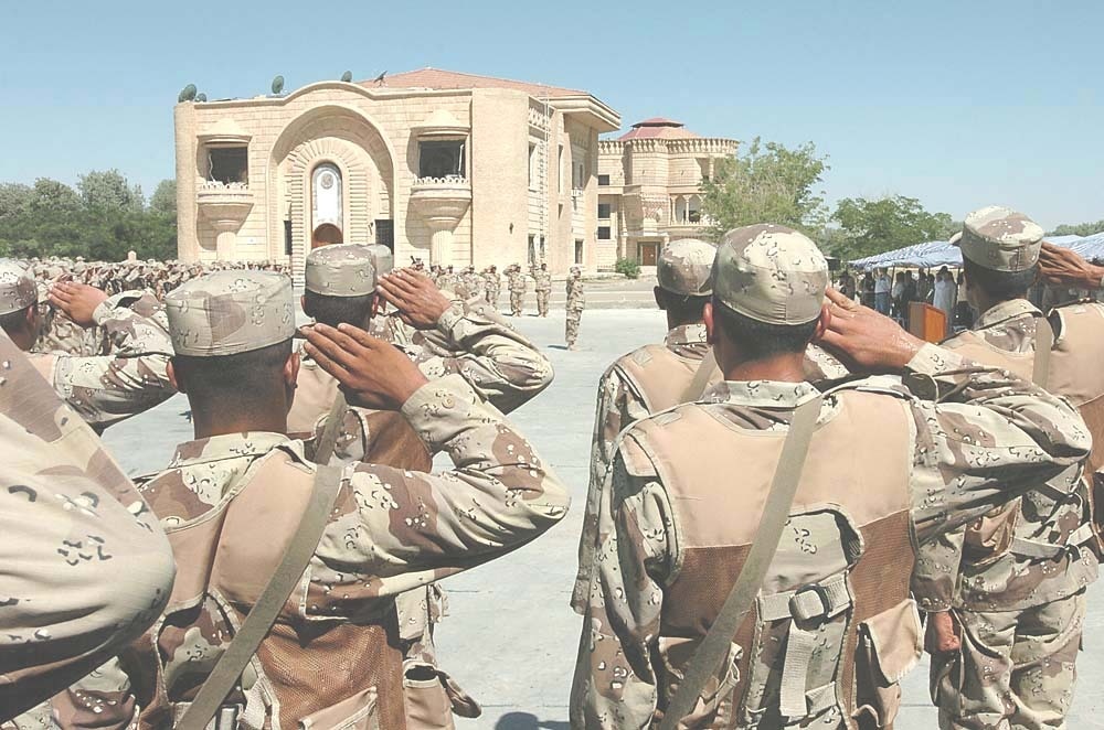 the playing of the Iraqi national anthem during their graduation ceremony