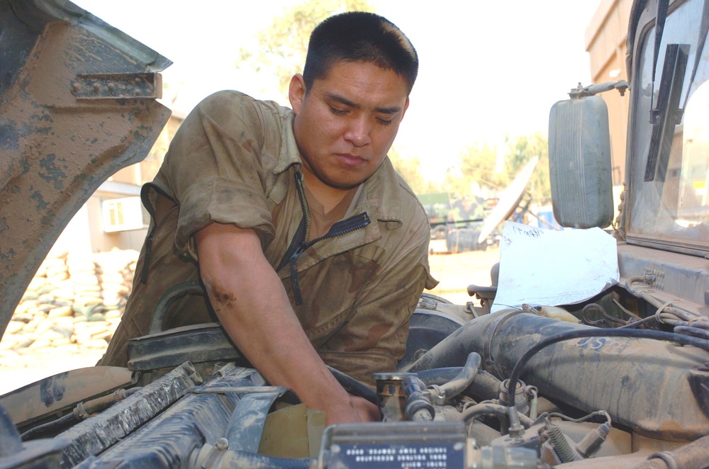 Spc. James, a mechanic with 29th Signal Battalion