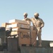 1-18th Infantry soldiers strap down a load of cargo