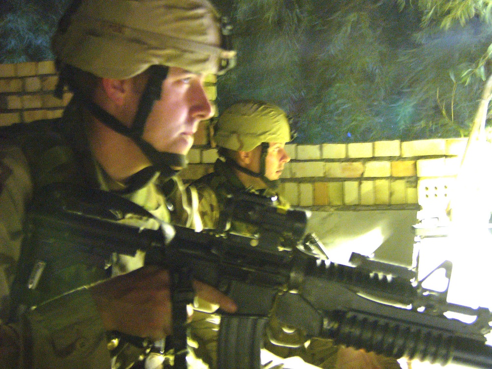 Cpl. McDaniel talks to another MP