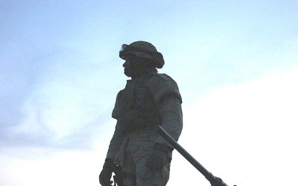 Spc. Marcus White waits to leave Camp Al Saqr