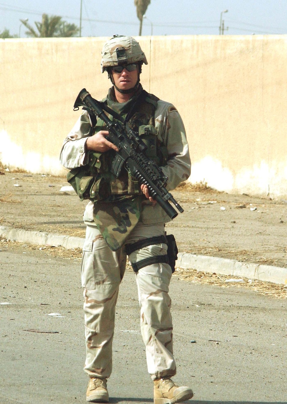 Cpl. Steve Warming walks through the streets