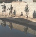 Soldiers conduct a dismounted patrol in Hawija