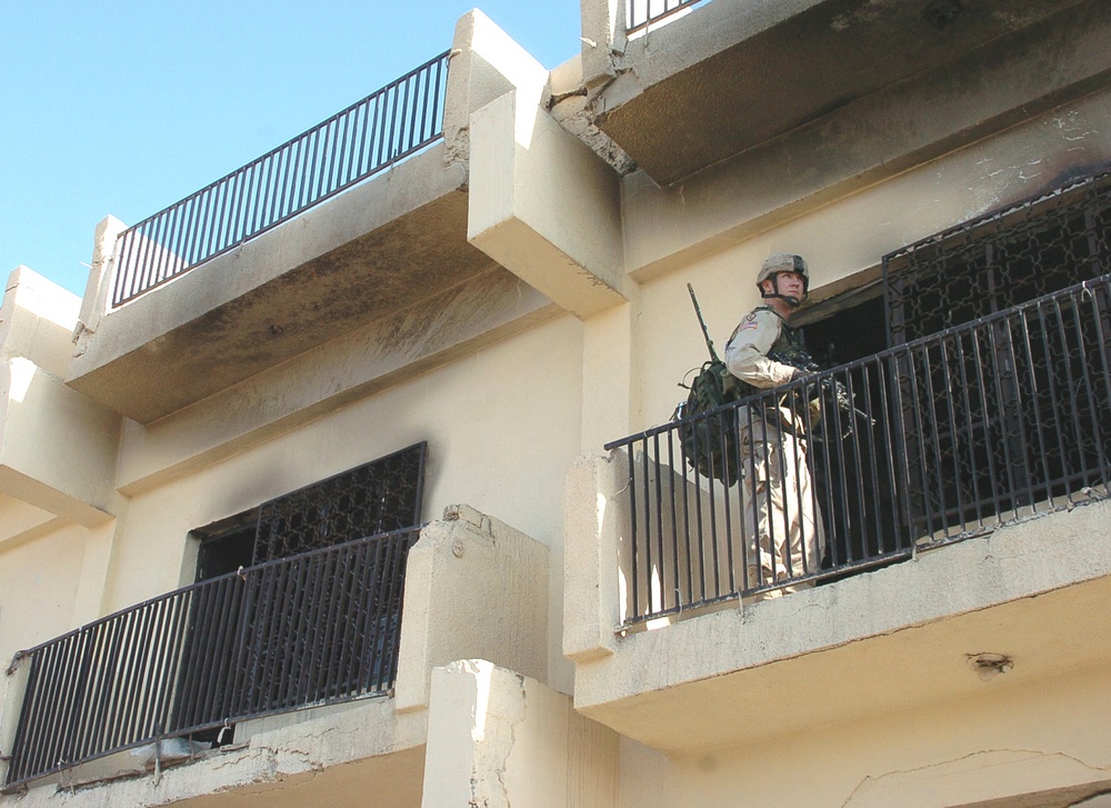 Pfc. Michael Hammer looks out for insurgent activity