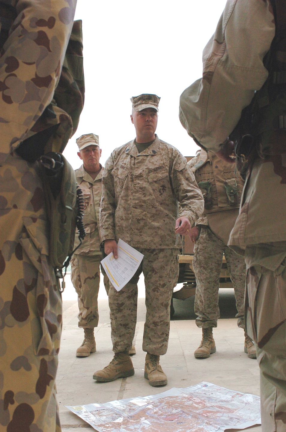 Gunnery Sgt. Michael Grow gives a convoy briefing