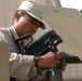 Army Sgt. Doug Jessup prepares for a convoy