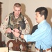 1st Lt. Samuel Wigley inspects a radio