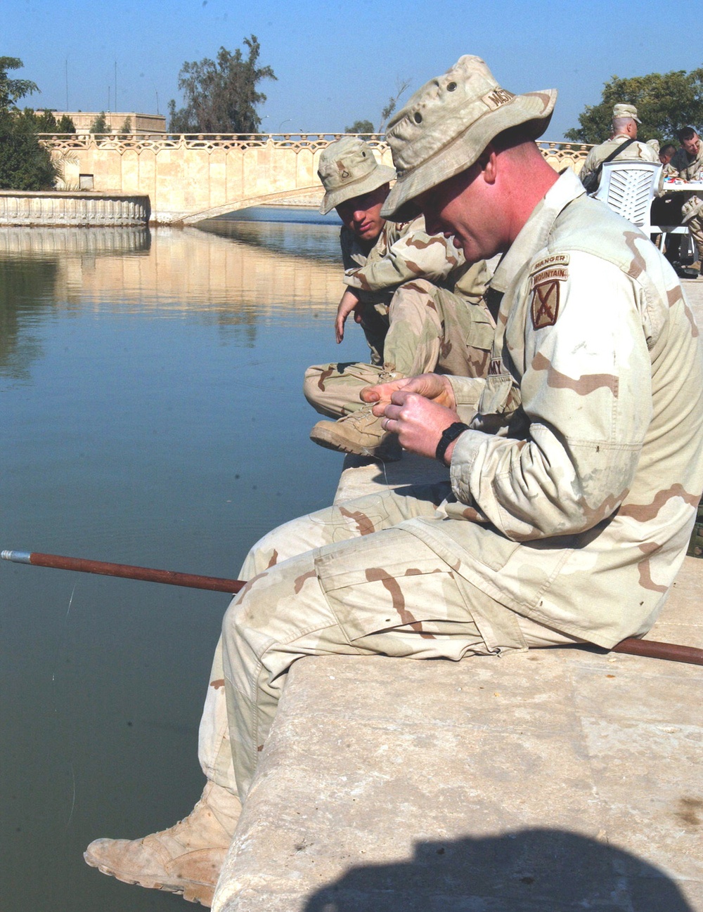 SSgt. Mastrodomenico attaches bait to his hook