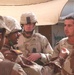 SSgt. Joesph Johansen speaks with soldiers