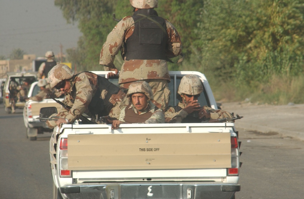 Soldiers patrol the streets of Baghdad