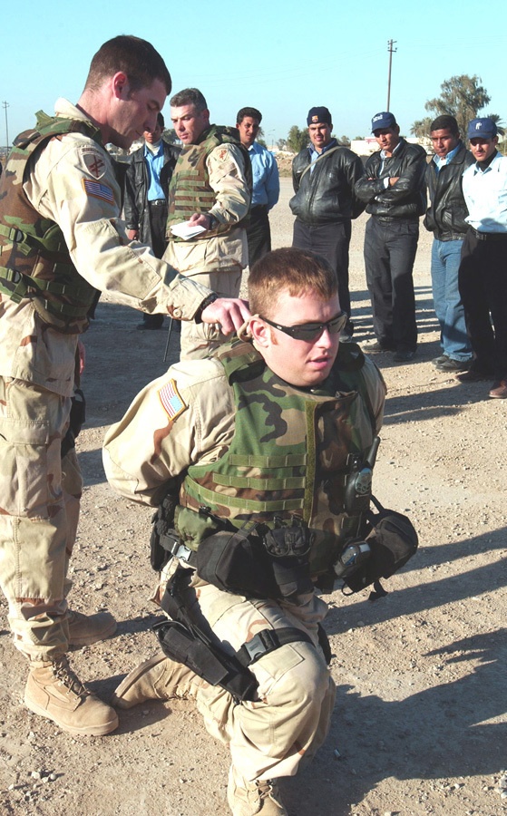 Cpl. Keith Strong demonstrates how to detain a suspect