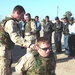 Cpl. Keith Strong demonstrates how to detain a suspect