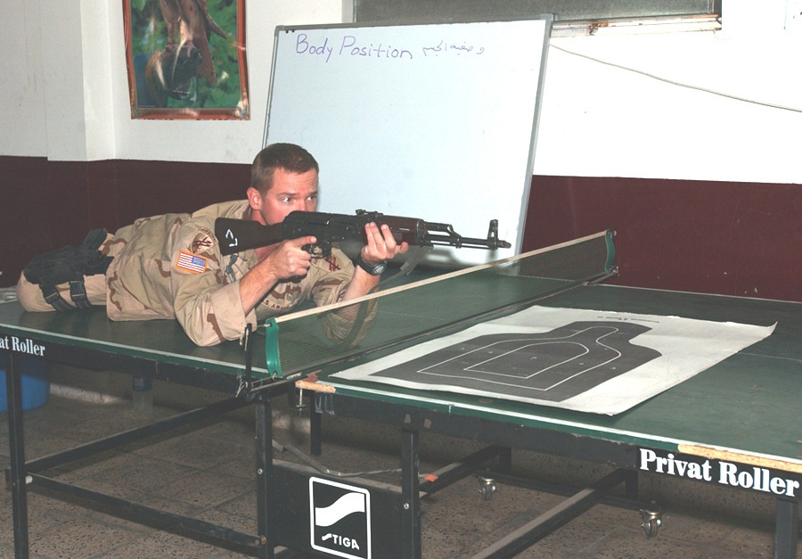 Sgt. Les Coash assumes a good prone position