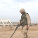 Pfc Todd Rampmeyer sweeps a soccer field