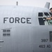 A crew chief cleans the windows of his C-130 aircraft