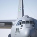 Crew chiefs  refuel a C-130