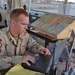 Sgt. Matt Schuldt updates the Flight Data Positioning System