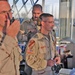 Soldiers look out of Taji Tower watching aircraft