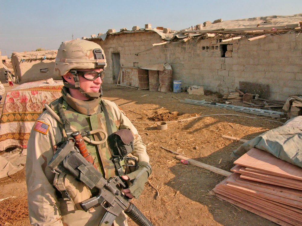 Capt. Pat Marsh talks to a local farmer