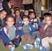Kids at the Salhiya Orphanage enjoy treats