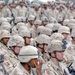 Pfc. Jenkins wipes his eye during Spc. Mahlenbrock memorial cere