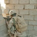 PFC Akil K. Ellis pulls security from a building