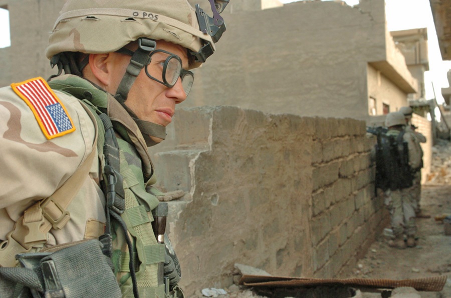 SFC Anthony J. Neusch scans for enemy activity