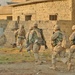 Soldiers clear houses in Fallujah during Operation Al-Fajr
