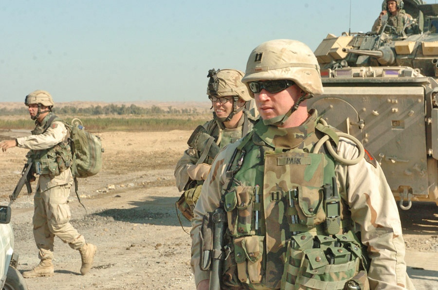 CPT Park dismounts to help lead his convoy