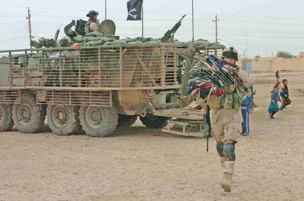 Cavalry Soldiers donate backpacks to Iraqi schoolchildren