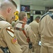 Troopers bow their heads in a moment of prayer