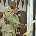 Lt. Col. Lewis cuts the ceremonial yellow ribbon