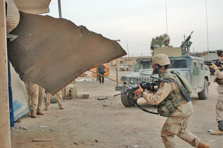 1LT Chris Boggiano charges into a building