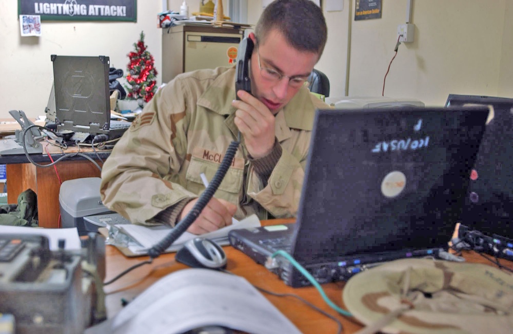 Senior Airmen McClish provides real-time weather information