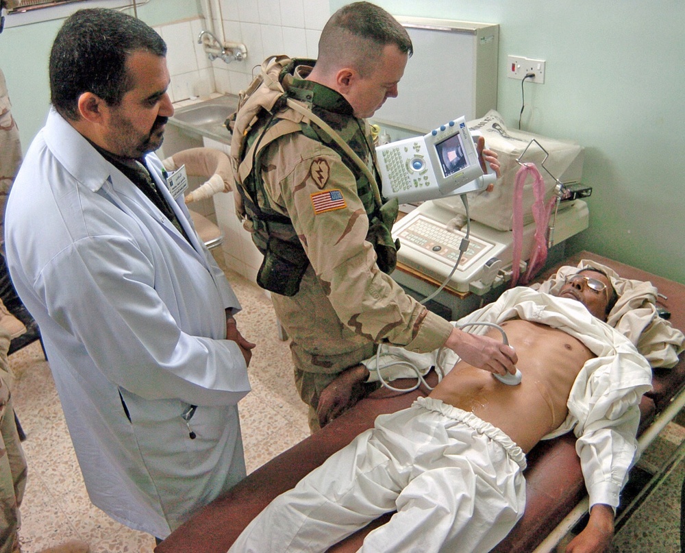 Maj. Buck shows how to properly use the SonoSite ultrasound syst