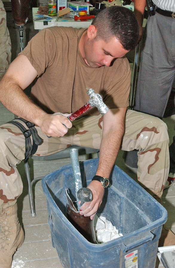 Capt. Rob Edwards busts plaster out of socket